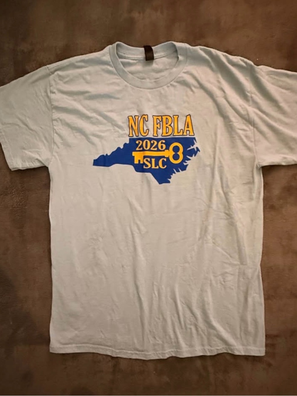 Gildan Light Blue NC FBLA 2026 Blue & Yellow Graphic Tee